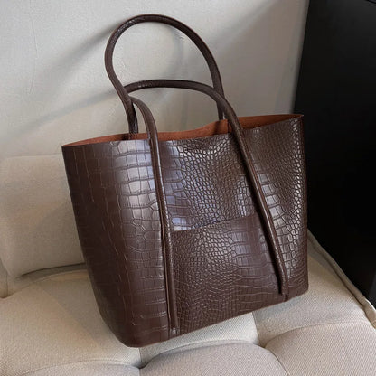 Iversen™ Betina | Sac à bandoulière vintage en cuir marron avec impression crocodile.