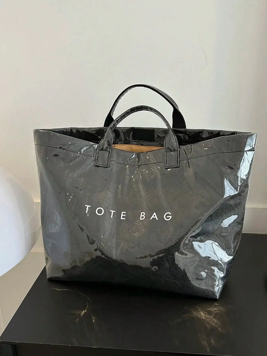 TOTE - Sac spacieux et déperlant