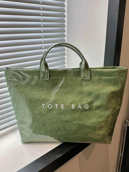 TOTE - Sac spacieux et déperlant