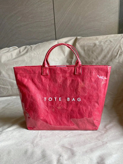 TOTE - Sac spacieux et déperlant