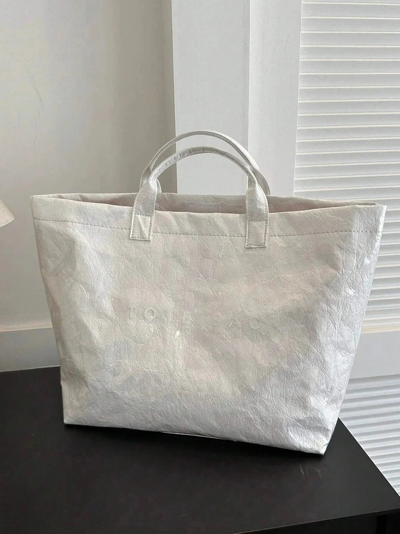 TOTE - Sac spacieux et déperlant