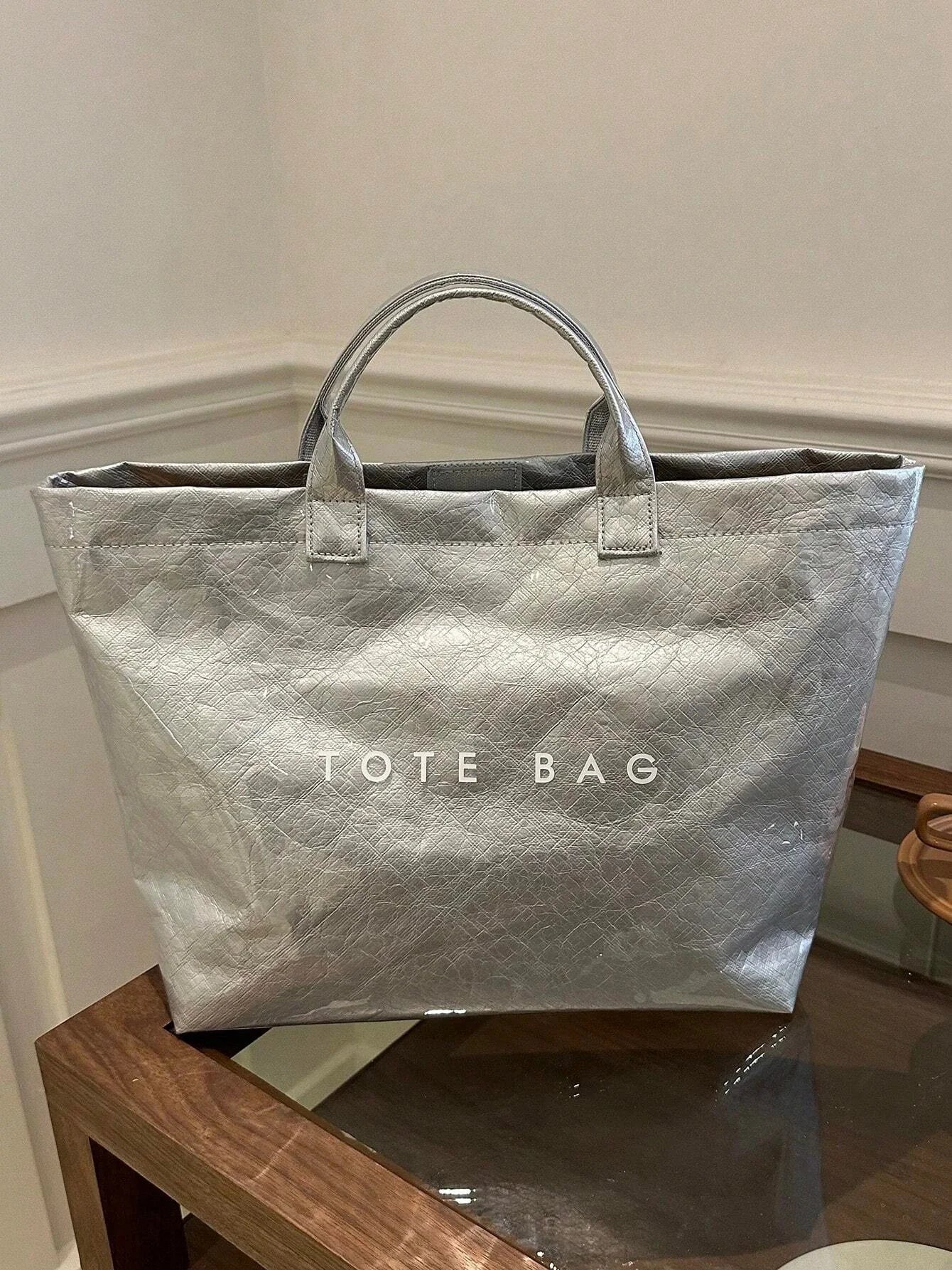 TOTE - Sac spacieux et déperlant